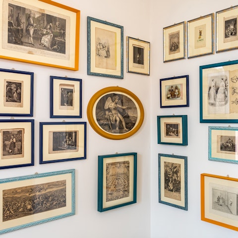 Admire the quirky collection of art throughout the apartment