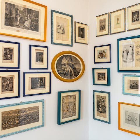 Admire the quirky collection of art throughout the apartment