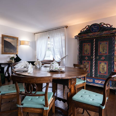 Admire the home's classical styling and antique furnishings