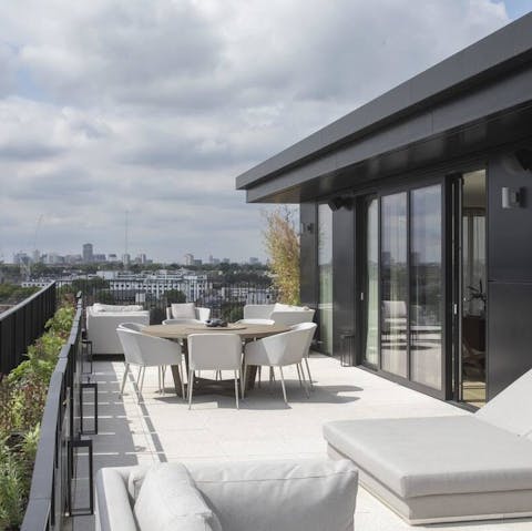 Take sundowner's up to the shared rooftop terrace