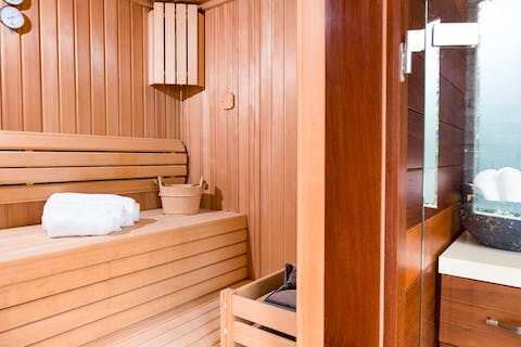 Relax in the sauna and hot tub after working out in the gym