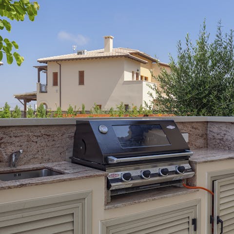 Get some burgers or kebabs sizzling on the barbecue before dining alfresco on the terrace