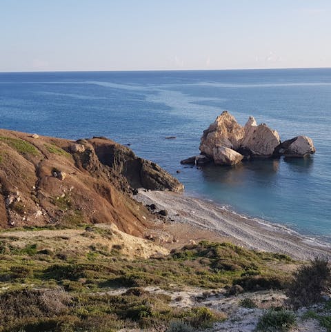Take the short drive to Petra tou Romeoui and Aphrodite beach for a romantic beach day