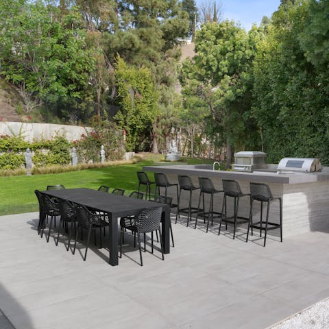 Light the barbecue and serve the drinks in the garden