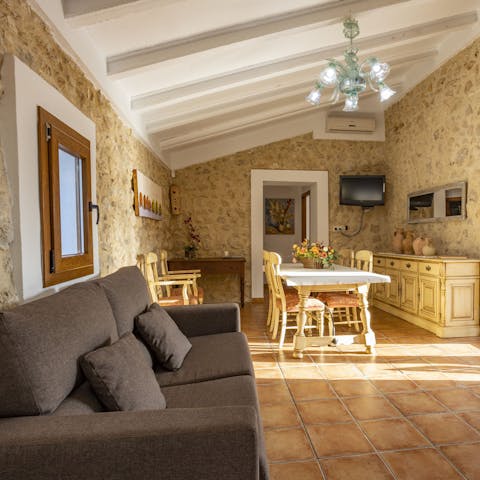 Get cosy in the bright and characterful living room