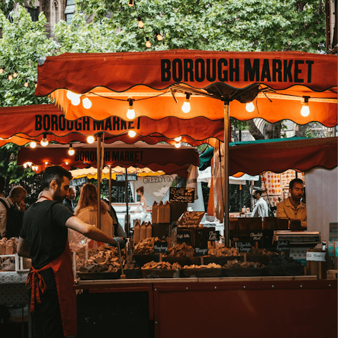 Discover culinary delight at Borough Market, just a ten-minute bus ride away