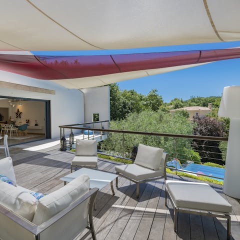 Shelter from the midday sun on the elegant deck
