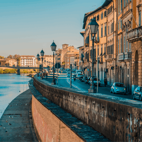 Drive thirty-five minutes to Pisa for a day of shopping and dining