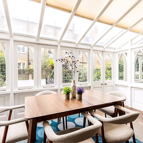 Tuck into family favourites in the conservatory-style dining room