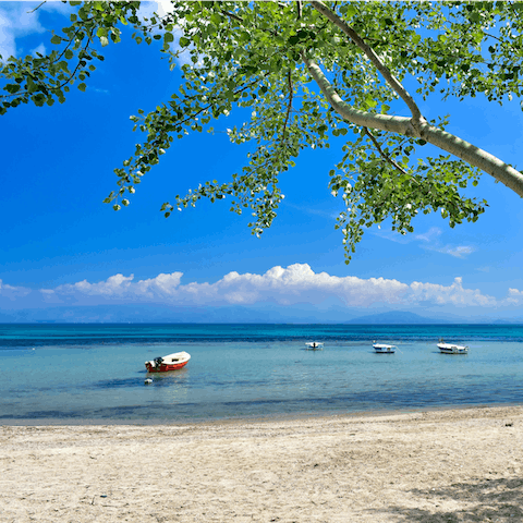 Stay in the idyllic village of Benitses on Corfu, 100m from the beach