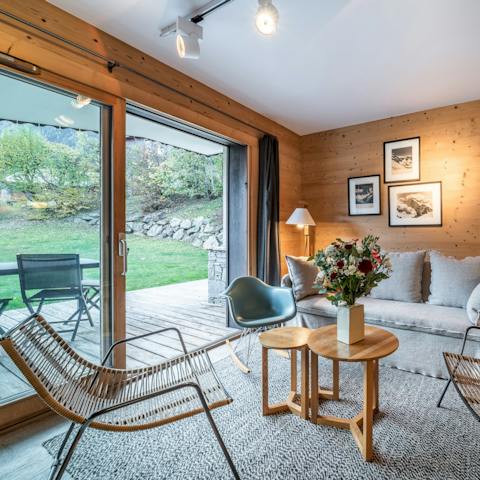 Slide open the glass doors to blend the terrace with the living room