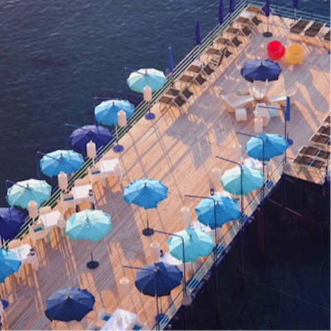 Book a spot at one of Sorrento's nearby beach clubs