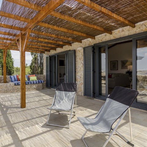 Hide away with a book on the private terrace
