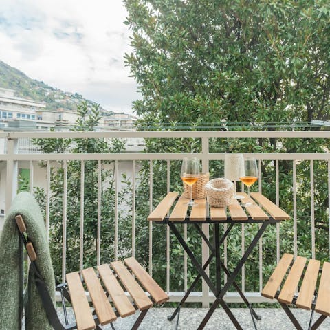 Enjoy a sundowner on the private balcony