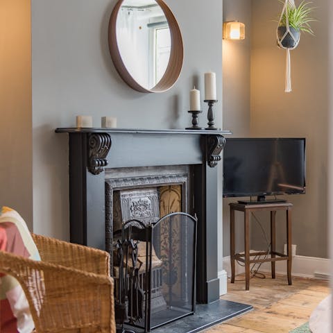 Gather in the cosy living room after a long day and light the fire on chilly evenings