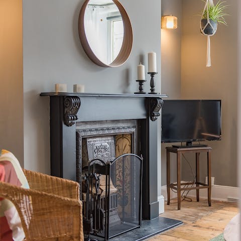 Gather in the cosy living room after a long day and light the fire on chilly evenings