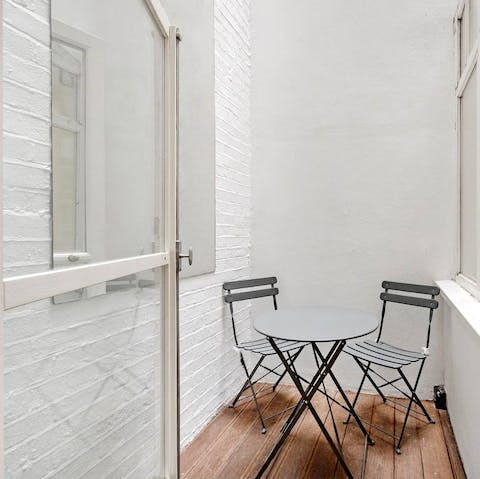 Sit out in the small and cosy terrace with a cup of tea