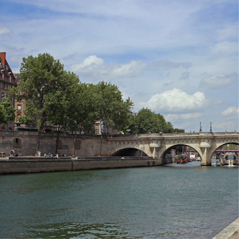 Stroll along the Seine listening to buskers and taking in the sights