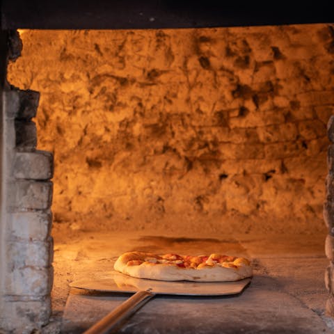 Get the perfect slice tailored just to you from the outside pizza oven