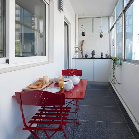 Enjoy some pastel de natas on the private balcony