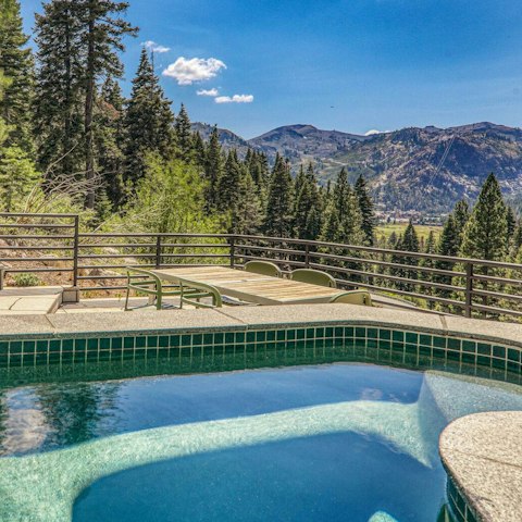 Soak in the views from the private stone hot tub