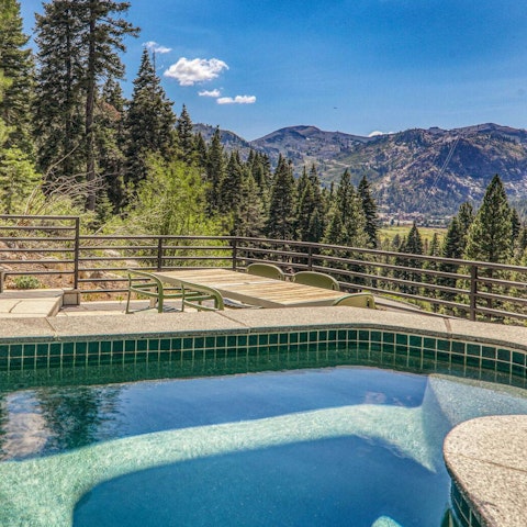 Soak in the views from the private stone hot tub