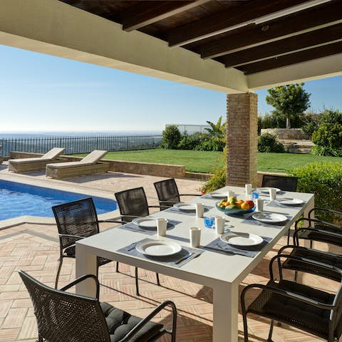 Come together for an alfresco feast on the shaded patio