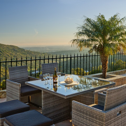 Soak up stunning views of the Algarve as you sip a traditional aperitif