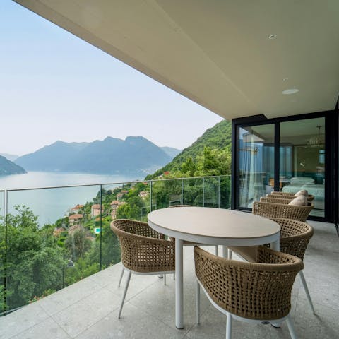 Admire the lake views from the main bedroom's balcony
