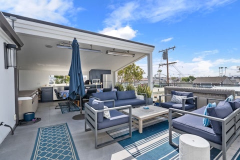 Pop open a bottle of fizz and watch the sunset from the terrace