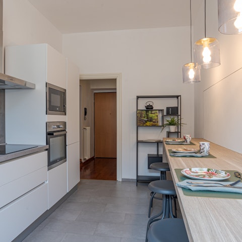 Perch at the breakfast bar with a milky coffee and the day's headlines