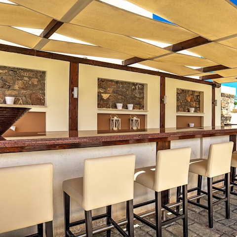 Whip up a batch of cocktails at the outdoor bar