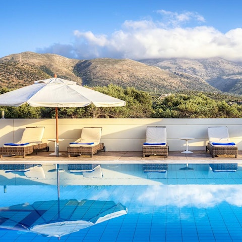 Gaze at the incredible vista as you float in the swimming pool