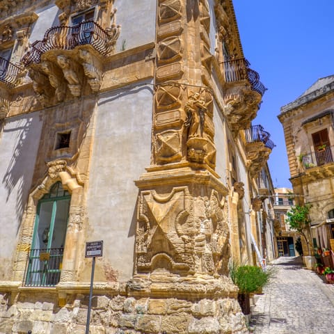 Explore the charming streets of Scicli, just an eight–minute drive away