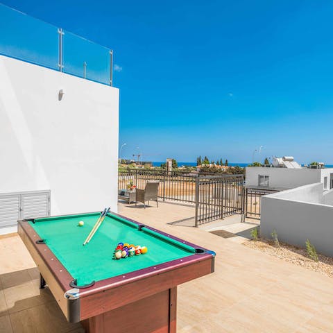 Show off your talent for potting on the open-air pool table