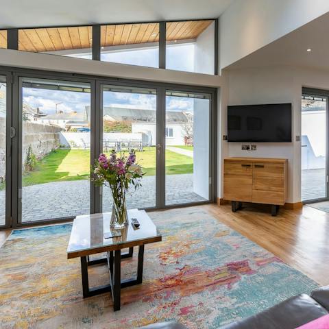 Open the patio doors to create a huge indoor-outdoor living space in summer