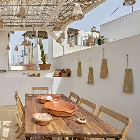 Cook in the outdoor kitchen then dine alfresco