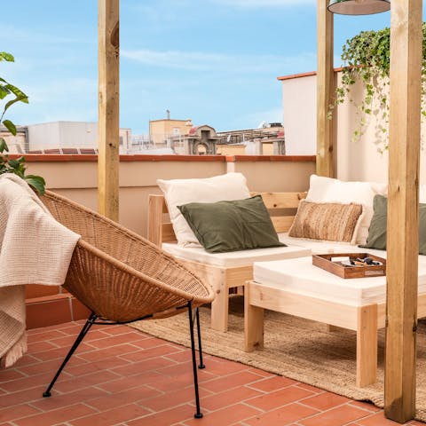 Open a bottle of wine and watch the sunset from your stylish terrace