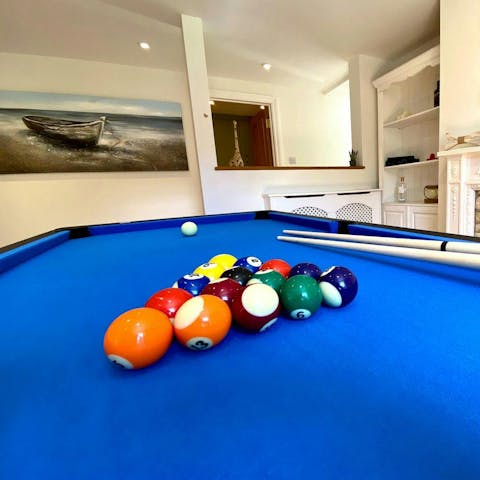 Get competitive with a few games of pool or air hockey