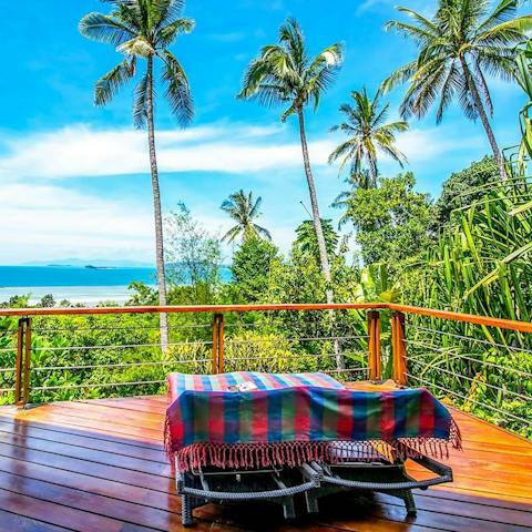 Catch some rays from your private terrace, surrounded by palm trees, enjoying your current read