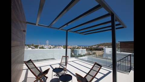 Sit back under the pergola with sea views stretching ahead