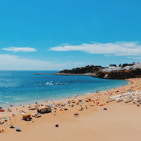 Drive five minutes to Albufeira's golden beaches