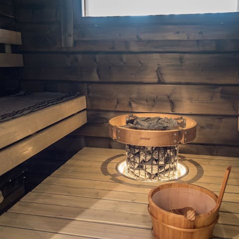 Unwind in the home sauna after an adventurous day amidst the nature