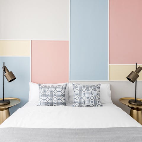 Wake up in the comfortable, colourful bedroom feeling rested and ready for another day of exploring the city