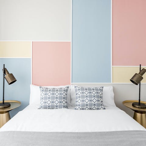 Wake up in the comfortable, colourful bedroom feeling rested and ready for another day of exploring the city