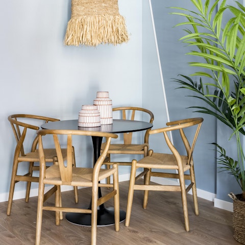 Gather together for celebratory meals in the chic beach-inspired dining nook
