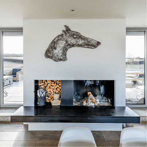 Get cosy by the fireplace