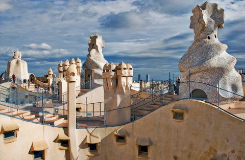 Explore La Pedrera's iconic undulating façade, ten minutes away
