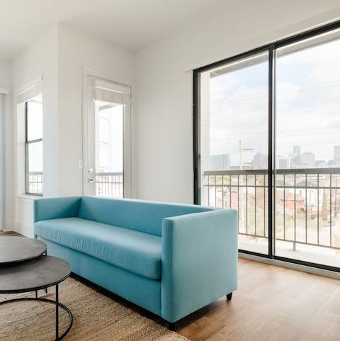 Gaze at dreamy views of Houston from your private balcony