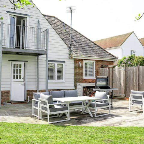 Sip wine and dine al fresco in the sun-drenched enclosed garden